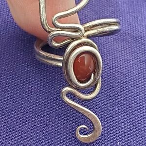 Elegant Silver and Brown Swirl Ring